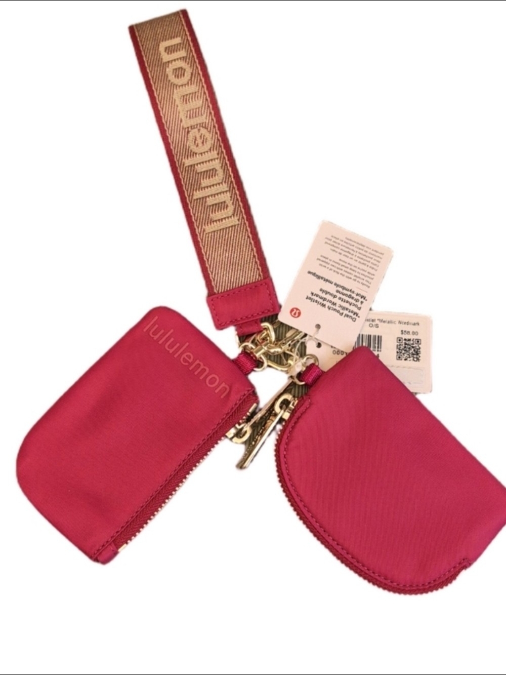 lululemon hot pink double pouch keychain with branded strap